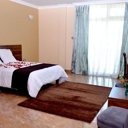 Melodie Hotel Addis Abeba Buitenkant foto