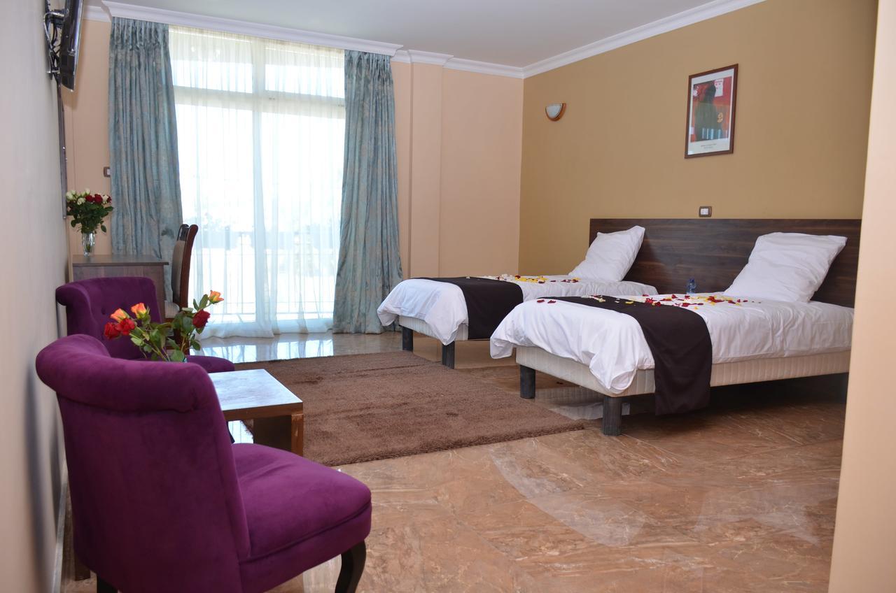 Melodie Hotel Addis Abeba Buitenkant foto